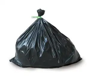 Black garbage bag with a County bag tag secured at the top