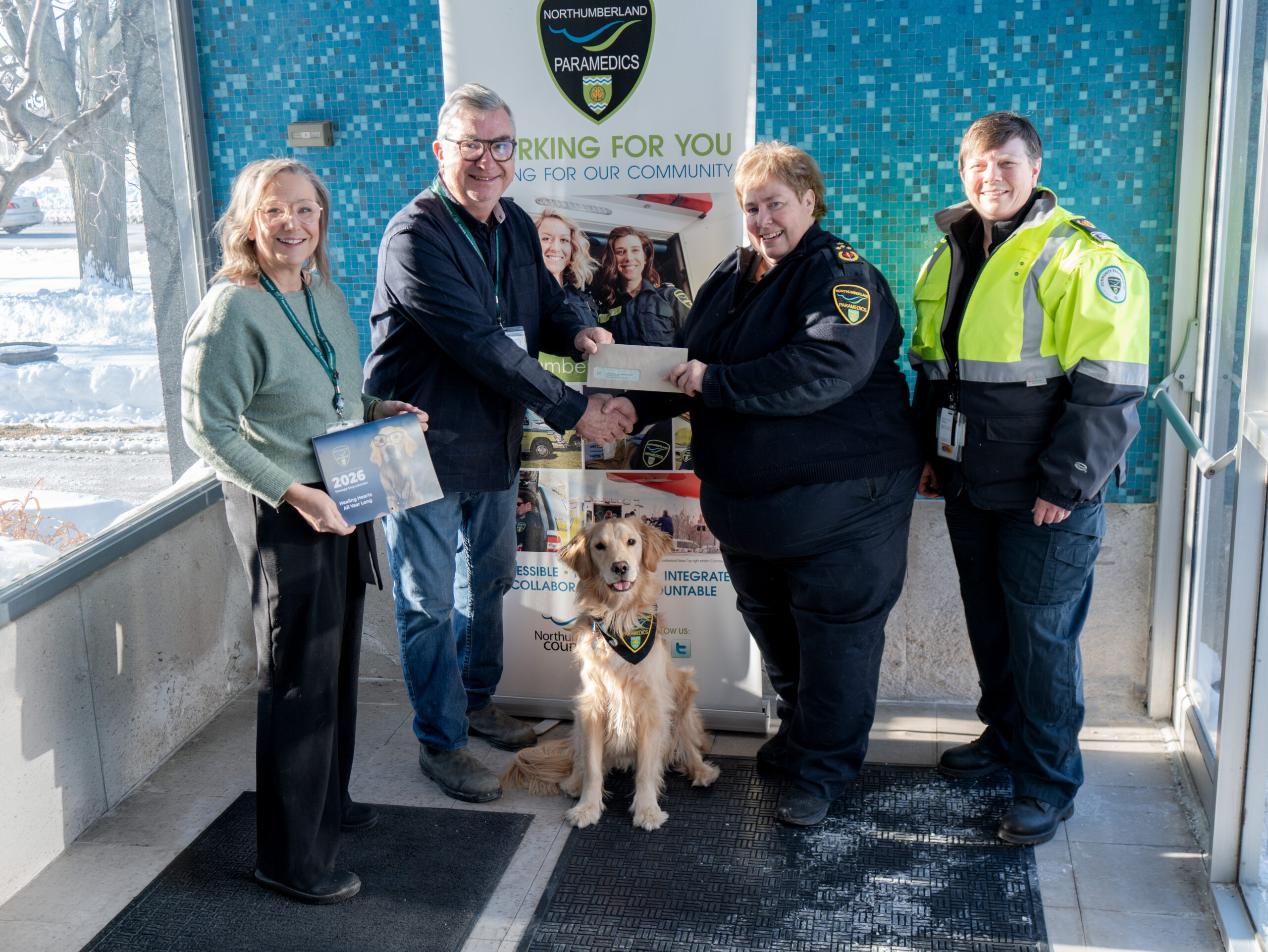 Left to Right—Northumberland Humane Society Community Outreach Specialist Krystyne Gillespie , Northumberland Humane Society Director of Operations Max Chipman, Northumberland Paramedics Therapy Dog Ivy Joules, Northumberland Paramedics Chief Susan Brown, Northumberland Paramedics Deputy Chief of Community Paramedicine Kim Wilkinson